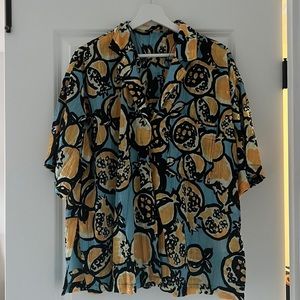 Zara: blue and yellow Pomegranate themed blouse. Size US XS.